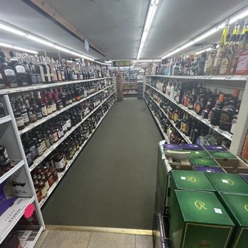 Pat & Gary's - the aisle of a liquor store - Grocery Near Me - Indian River, Michigan