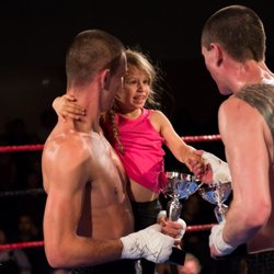 Martial Arts Unlimited Victoria - Sensei Greg introducing his daughter to an opponent moments after a match. For such a tough sport, it is full of wonderful, kind people!