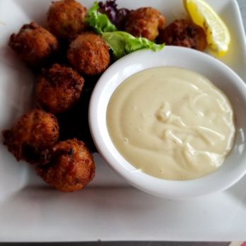 Conch Republic Seafood - Delicious Conch Fritters and sauce - Seafood Near Me - Key West, Florida