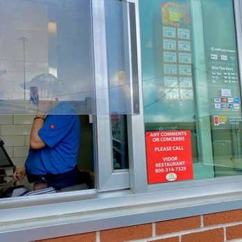 McDonald's - a man sitting in a window - Fast Food Near Me - Vidor, Texas McDonald's - a man sitting in a window - Fast Food Near Me - Vidor, Texas