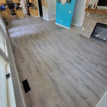 G7 Construction - a view of a living room and kitchen - Flooring Near Me G7 Construction - a view of a living room and kitchen - Flooring Near Me