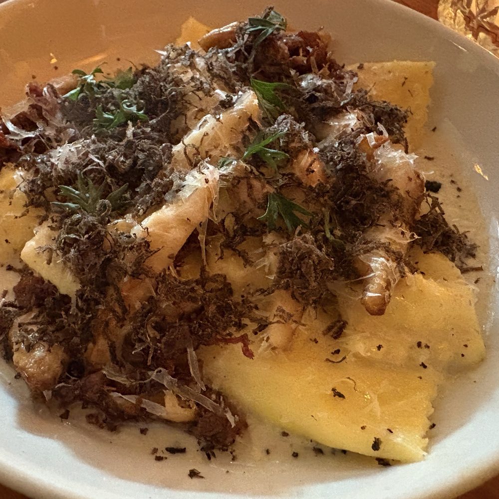 Merci - Agnolotti pasta with lions mane mushrooms, short rib and black truffle - French Near Me - Charleston, South Carolina