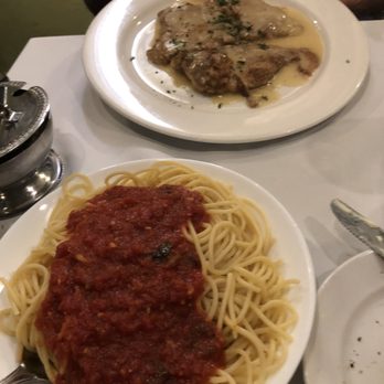 Richard Accursio's Capri Restaurant - Veal Francese with a side of spaghetti pomodora. - Italian Near Me - Florida City, Florida Richard Accursio's Capri Restaurant - Veal Francese with a side of spaghetti pomodora. - Italian Near Me - Florida City, Florida