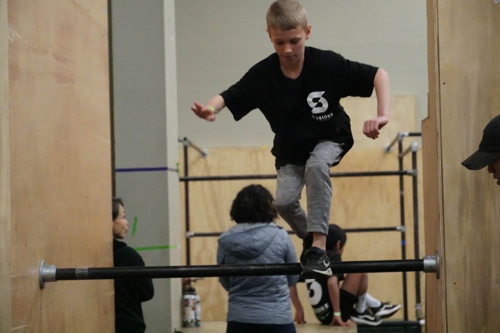 Sessions Academy of Movement Logo