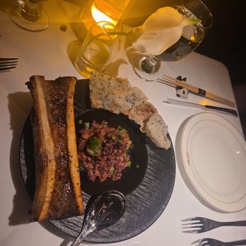 Philippe Chow - Bone marrow with steak tartar - Salad Near Me - Nashville, Tennessee Philippe Chow - Bone marrow with steak tartar - Salad Near Me - Nashville, Tennessee