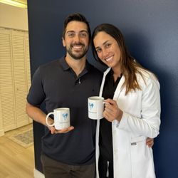 Ocean Waves Dentistry - Office manager and Dr. Alvarado with some new mugs to celebrate the new office.