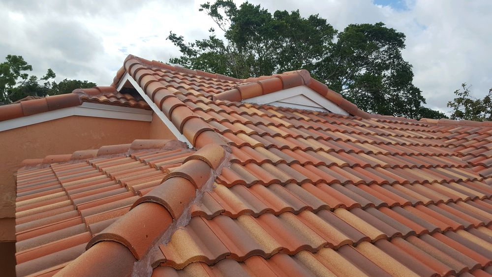 Slide of TNT Roofing