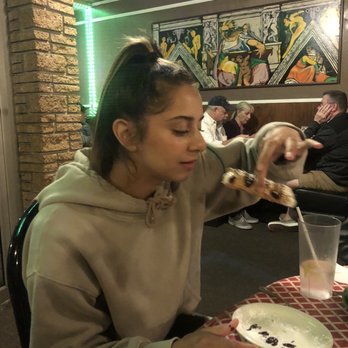 Don Vito's Italian Restaurant - Madi enjoying a Cannoli... - Italian Near Me - Daytona Beach, Florida Don Vito's Italian Restaurant - Madi enjoying a Cannoli... - Italian Near Me - Daytona Beach, Florida