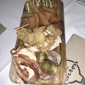 The Edison - Southern Board - Fried Gulf Oysters, Brown Sugar Bacon, Pimento Cheese, Pickled Vegetables, Fried Green Tomatoes, & Toast Points - Steakhouses Near Me - Tallahassee, Florida