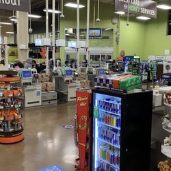Kroger - Half the self-check registers are closed with ALL regular registers closed and a lines that wraps across the front of the store.