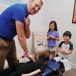 Ryan Lee, D.C - Reach Health and Wellness Chiropractic - These kiddos love getting adjusted and we love adjusting them! Kids get adjusted for free with an adult appointment!
