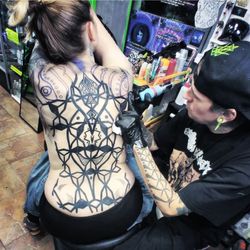 Cosmic Wizard Tattoo & 3D UV Gallery - We offer custom professional work, call us with your ideas.
: Humo working on a back piece soon to be a full  custom geometric body suit