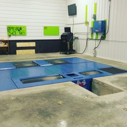 DynoSource Performance - Our Mustang MD-1100 AWD Dyno in its home at our shop.