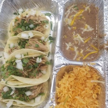 Taco Street - Carnitas taco plate with refried beans - Tacos Near Me - Tacoma, Washington Taco Street - Carnitas taco plate with refried beans - Tacos Near Me - Tacoma, Washington