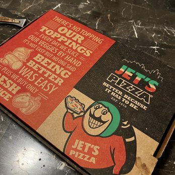 Jet's Pizza - a pizza box on a table - Pizza Near Me - Austin, Texas
