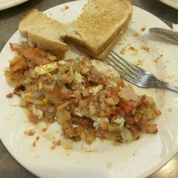 Minella's Diner - 2 eggs over easy, potatoes, corned beef hash and Sriracha in a delicious scramble, with toast. - Diners Near Me - Wayne, Pennsylvania Minella's Diner - 2 eggs over easy, potatoes, corned beef hash and Sriracha in a delicious scramble, with toast. - Diners Near Me - Wayne, Pennsylvania