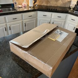 Crescent City Books - Full box that the wrapped print came in