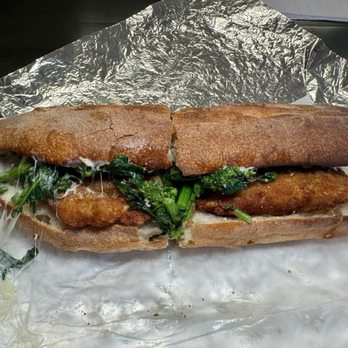 Delmonaco's Market - "Chicken Cutlet & Broccoli Rabe" sub on fresh Italian bread with melted mozzarella - Delis Near Me - New Haven, Connecticut Delmonaco's Market - "Chicken Cutlet & Broccoli Rabe" sub on fresh Italian bread with melted mozzarella - Delis Near Me - New Haven, Connecticut