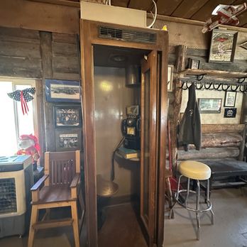 The Baum Shelter - Old phone booth inside restaurant. - Bars Near Me - Warren, Idaho