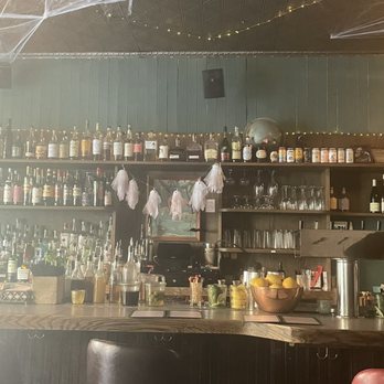 Broken Land - a bar with spider webs hanging from the ceiling - Bars Near Me - Brooklyn, New York