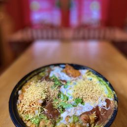 Samosa Chaat. A tone of sweet, sour, spicy and savory all at once. Samosa Chaat. A tone of sweet, sour, spicy and savory all at once.