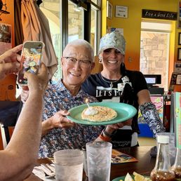 A birthday pancake complete with sprinkles, whipped cream and smiles! A birthday pancake complete with sprinkles, whipped cream and smiles!
