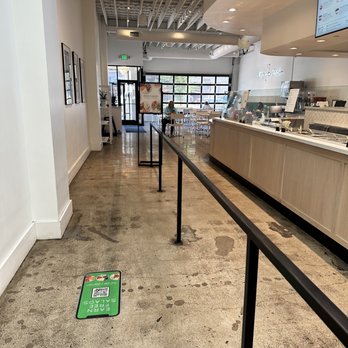 Crisp & Green - a long counter with a phone on the floor - Salad Near Me - Edina, Minnesota Crisp & Green - a long counter with a phone on the floor - Salad Near Me - Edina, Minnesota