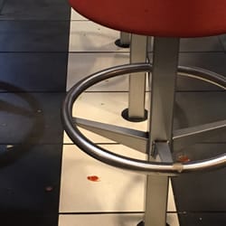 McDonald's - Dirty floors which had not been cleaned for sometime as the condiments were in the dried stage.