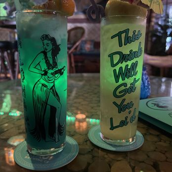 High Roller Tiki Lounge - Blue Hawaiian & This Drink Will Get You Lei'd. Delicious and came WITH a lei - Tiki Bars Near Me - Solvang, California High Roller Tiki Lounge - Blue Hawaiian & This Drink Will Get You Lei'd. Delicious and came WITH a lei - Tiki Bars Near Me - Solvang, California