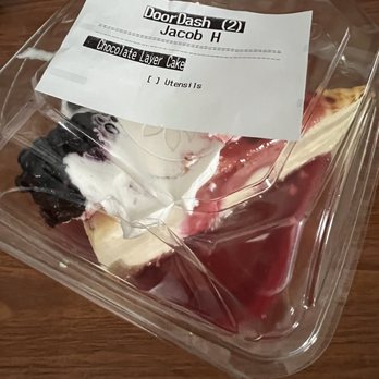 Café Zupas - a piece of cheesecake in a plastic container - Salad Near Me - Edina, Minnesota