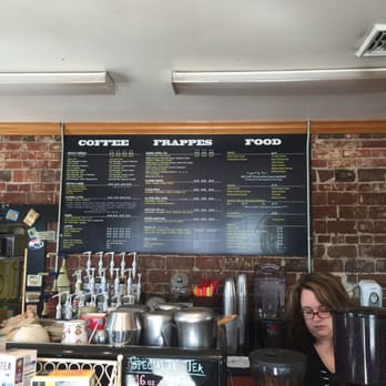 Java Java Cafe - a woman working at the counter - Cafes Near Me - Davenport, Iowa