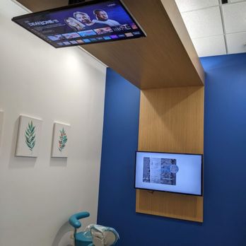 K Family Dentistry General Cosmetic Emergency Implants - 2 TVs - on the wall and ceiling - General Dentistry Near Me - Pflugerville, Texas K Family Dentistry General Cosmetic Emergency Implants - 2 TVs - on the wall and ceiling - General Dentistry Near Me - Pflugerville, Texas