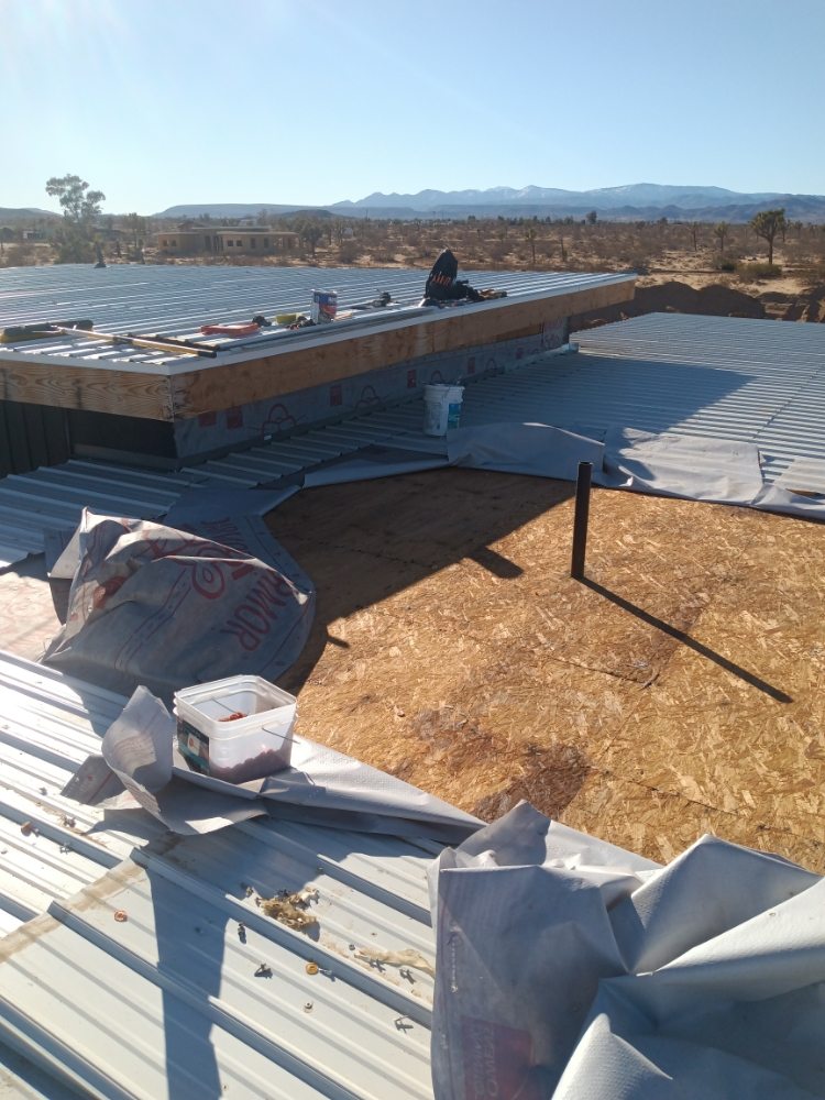 Slide of Moses Roofing