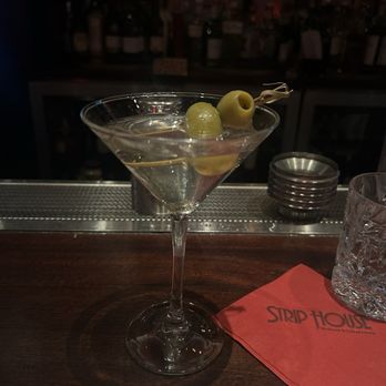 Strip House Steakhouse - Dirty martini (one olive already consumed :)) - Steakhouses Near Me - New York, New York Strip House Steakhouse - Dirty martini (one olive already consumed :)) - Steakhouses Near Me - New York, New York