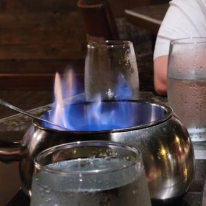 Photo of The Melting Pot - Sacramento, CA, United States. Flaming turtle