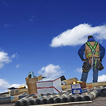 Preferred Roofing & Exteriors - a man standing on top of a roof - Roofing Near Me - St. Charles, Illinois Preferred Roofing & Exteriors - a man standing on top of a roof - Roofing Near Me - St. Charles, Illinois