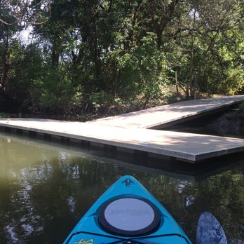 Cosumnes River Preserve - Boat dock. You have a little walk from parking lot to dock. Thank goodness for my kayak dolly wheels. Down hill coming but up to get back. - Parks Near Me - Galt, California