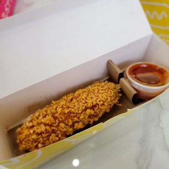 Mochinut - Crunchy ramen corn dog with mango habenero sauce - Donuts Near Me - Cary, North Carolina
