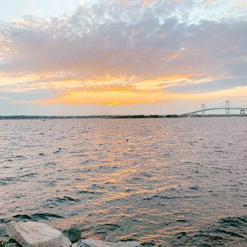 The Pineapple Club - a sunset over the water - Bars Near Me - Newport, Rhode Island