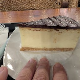 Cheesecake W/ Dark Chocolate on top Cheesecake W/ Dark Chocolate on top