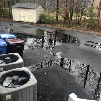 Hw Asphalt & Road Construction - a puddle of water - General Contractors Near Me - Yorktown, Virginia Hw Asphalt & Road Construction - a puddle of water - General Contractors Near Me - Yorktown, Virginia