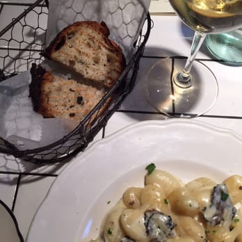 Briciola - Truffle gnocchi special, paired with white wine. Notice the side of (incredibly delicious) bread - Italian Near Me - New York, New York Briciola - Truffle gnocchi special, paired with white wine. Notice the side of (incredibly delicious) bread - Italian Near Me - New York, New York