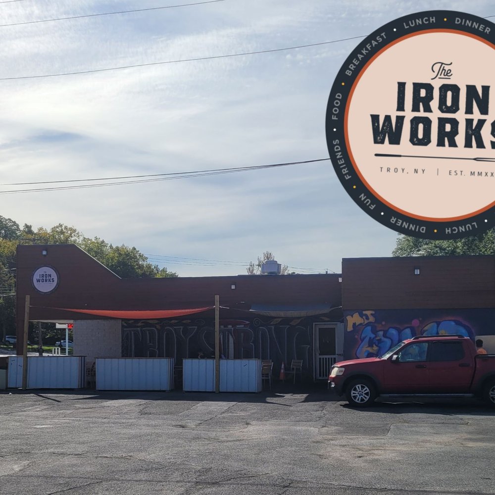 Iron Works Grill - a red truck parked in front of a restaurant - Barbeque Near Me - Troy, New York