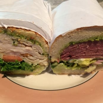 Miss Tomato - Turkey on the left and The Only Pastrami (TOP) on the right. He proudly shows you his sliced open creations. Big, hearty and Delicious! - Sandwiches Near Me - Pacifica, California Miss Tomato - Turkey on the left and The Only Pastrami (TOP) on the right. He proudly shows you his sliced open creations. Big, hearty and Delicious! - Sandwiches Near Me - Pacifica, California
