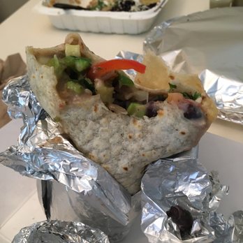 El Camion - half eaten veggie burrito - Food Trucks Near Me - Seattle, Washington