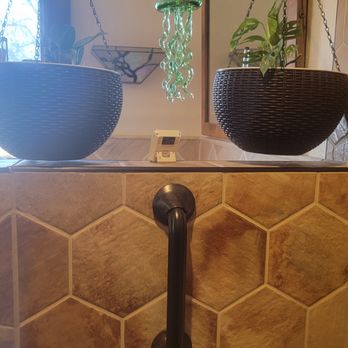 VersaTile - One of the safety bars. Plants are hanging from a grab bar he installed overhead. - Flooring Near Me VersaTile - One of the safety bars. Plants are hanging from a grab bar he installed overhead. - Flooring Near Me