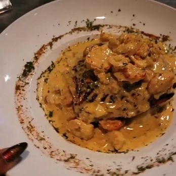 Monticello - Slammin' Salmon - Salmon, shrimp, crab meat on top of potatoes - Seafood Near Me - Marietta, Georgia Monticello - Slammin' Salmon - Salmon, shrimp, crab meat on top of potatoes - Seafood Near Me - Marietta, Georgia