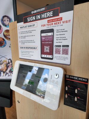 Kura Revolving Sushi Bar by null