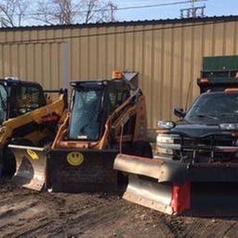 Aspen Ridge Landscaping & Tree Service - a row of snow plows - Landscaping Near Me Aspen Ridge Landscaping & Tree Service - a row of snow plows - Landscaping Near Me