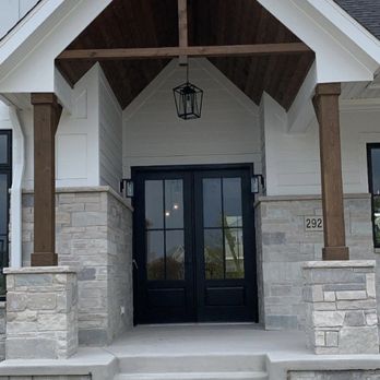 Pozder Builders - the front entrance of a home - General Contractors Near Me